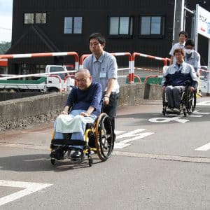 車椅子社員の避難